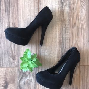 Brash black platform shoes
